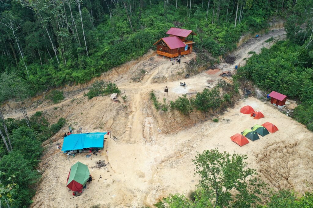 Aerial view of the Batang Kapas shelter and camping ground in a forest area near Lubuk Bigau