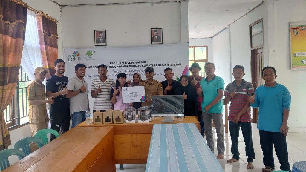 Handover of computers and camera traps to Lubuk Bigau Village under the PLN Empowered Village Programme in 2024.
